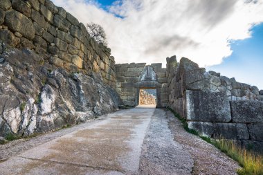 The archaeological site of Mycenae near the village of Mykines, with ancient tombs, giant walls and the famous lions gate,  Peloponnese, Greece clipart