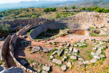 The archaeological site of Mycenae near the village of Mykines, with ancient tombs, giant walls and the famous lions gate,  Peloponnese, Greece clipart