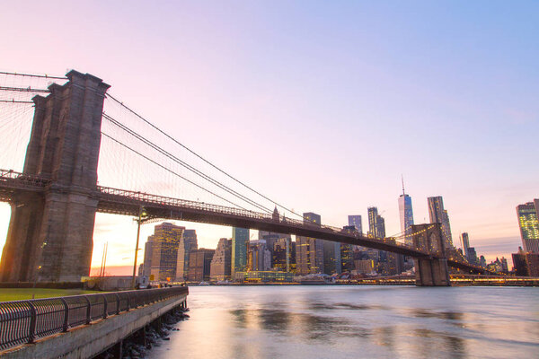 New York, the world famous New York skyline with the Brooklyn Bridge