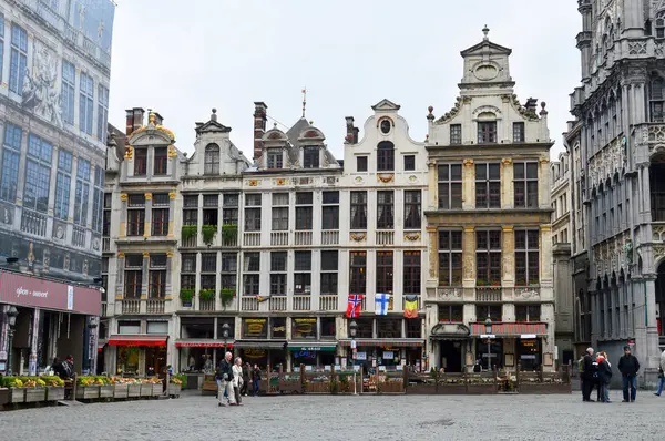 Brussels, Belgium - April 2015: Grand Place, most memorable landmark of Belgium located at central square of Brussels City surrounded by opulent classic buildings and edifices — Stock Photo, Image