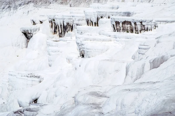 Dry travertine terraces-pools in Pamukkale. Turkey.