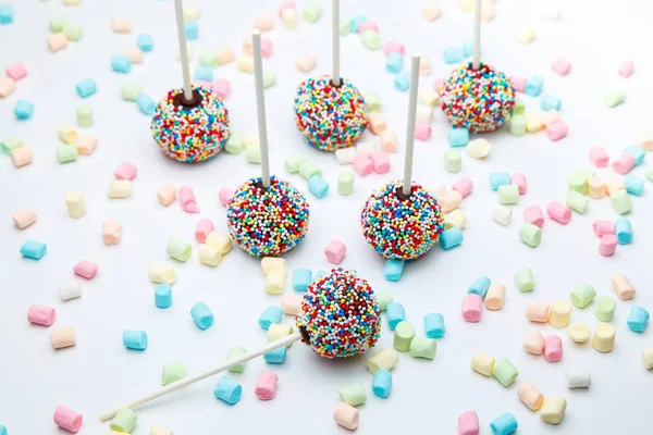 Brownie cake pops with color sugar pearls and marshmallow — Stock Photo, Image