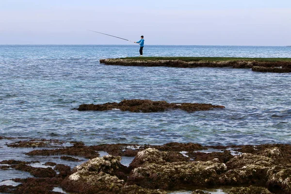 Människan och havet — Stockfoto