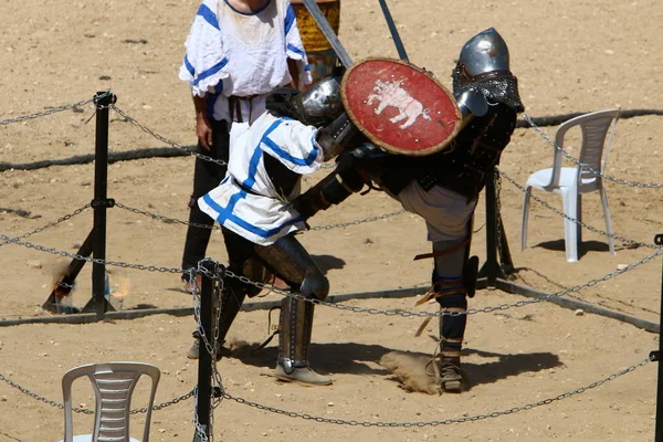 fight of knights on swords in knights\' outfit in Israel