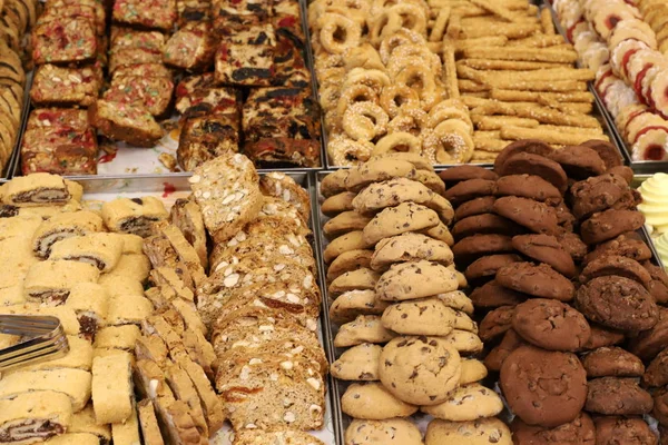 a variety of bread and bakery products that are made and sold in a large store in Israel