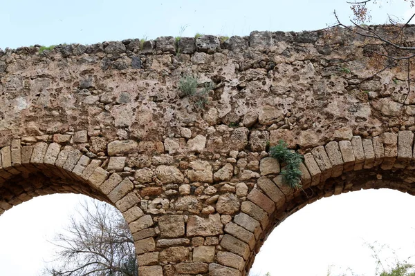 Old stone viaduct in the city of Acre. The system of water supply from sources to the city