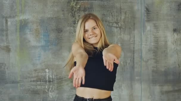 Beautiful Blond Hair Girl Dancing Hiphop On The Gray Wall Slow