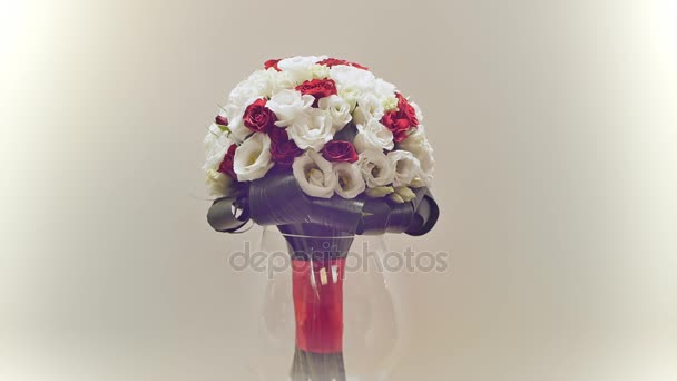 Wedding bouquet of rose bush, eustoma and greens. Bouquet in rotation.