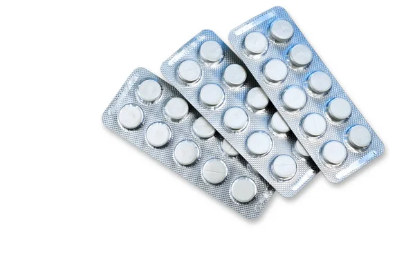 Tabletki w blistrze, na białym tle — Zdjęcie stockowe
