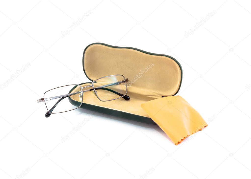 Reading glasses with case and flannel cloth on white background
