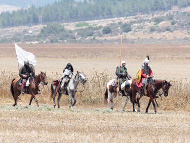 Katılımcılar Hıttin boynuzları, savaşta yeniden inşası 