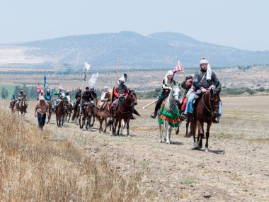 Katılımcılar Hıttin boynuzları, savaşta yeniden inşası 