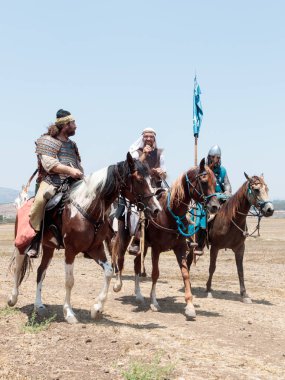 Katılımcılar Hıttin boynuzları, savaşta yeniden inşası 