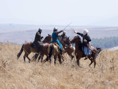 Katılımcılar Hıttin boynuzları, savaşta yeniden inşası 