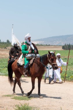 Katılımcılar Hıttin boynuzları, savaşta yeniden inşası 