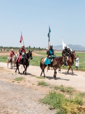 Katılımcılar Hıttin boynuzları, savaşta yeniden inşası 