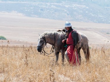 Katılımcılar Hıttin boynuzları, savaşta yeniden inşası 