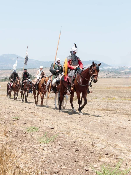 Katılımcılar Hıttin boynuzları, savaşta yeniden inşası 