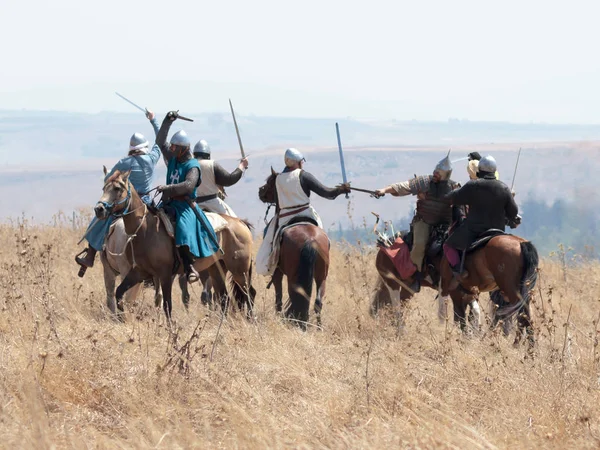 Katılımcılar Hıttin boynuzları, savaşta yeniden inşası 