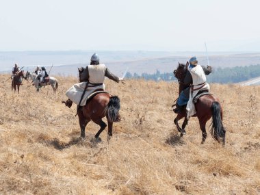 Katılımcılar Hıttin boynuzları, savaşta yeniden inşası 