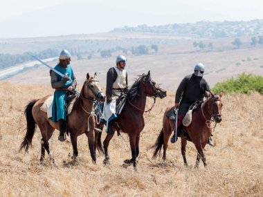 Katılımcılar Hıttin boynuzları, savaşta yeniden inşası 