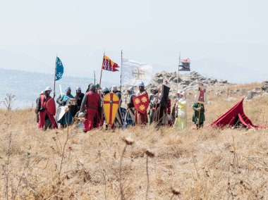 Katılımcılar Hıttin boynuzları, savaşta yeniden inşası 