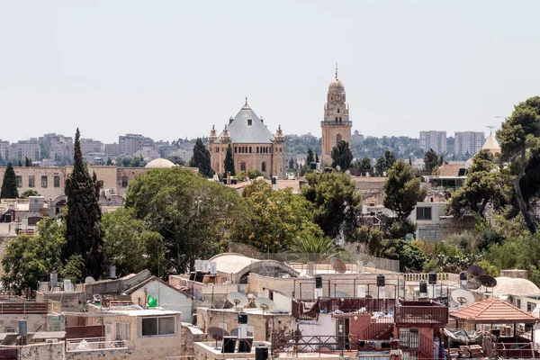 View of the  Tower of David over the Tomb of King David in Dormition abbey and Jerusalem from the Corner tower of the Evangelical Lutheran Church of the Redeemer in the old city of Jerusalem, Israel.