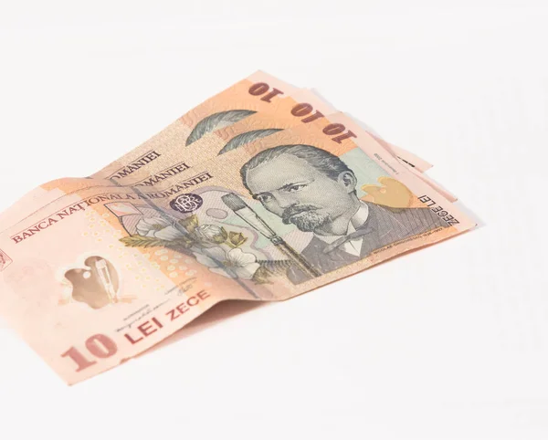 Három bankjegyeket érdemes 10 román lej elszigetelt fehér background — Stock Fotó