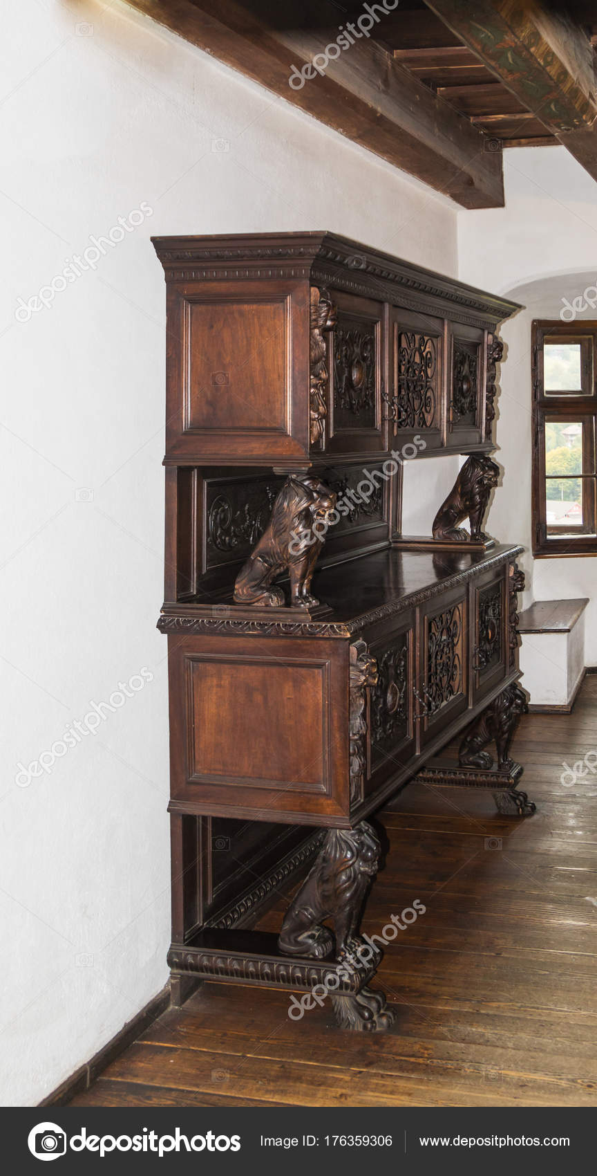 Cabinet Decorated With Decorative Lions In The Guest Room In