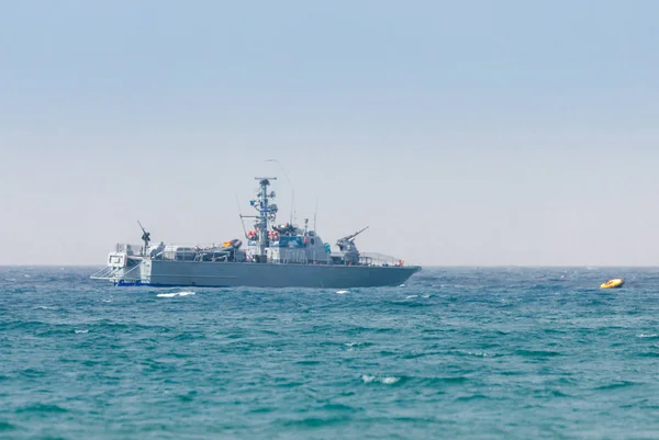 All-weather patrol boat patrol on a cloudy day near the shore of the sea space of the country