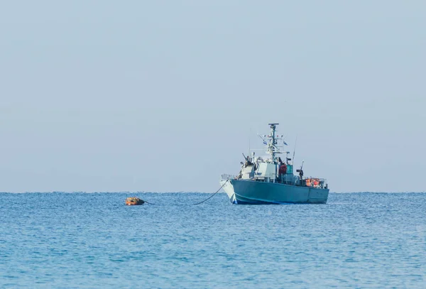 All-weather patrol boat patrol on a cloudy day near the shore of the sea space of the country