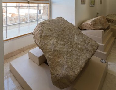 Stone with words engraved on it in Aramaic - exhibit of the Museum of the Good Samaritan near Jerusalem in Israel