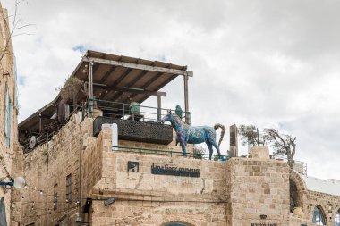 Tel Aviv-Yafo, Israel, February 01, 2020 : The balcony of the Ilana Goor museum with sculptures installed on it in old Yafo in Israel