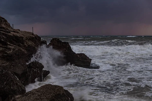 Stormy weather in the evening at sunset on the Mediterranean coast near Rosh HaNikra in Israel