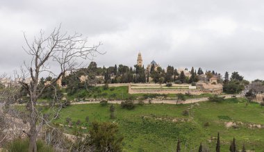Jerusalem, Israel, February 29, 2020 : View of the old city of Jerusalem, Dormition Abbey and King David Tomb from the Abu Tor district of Jerusalem city in Israel