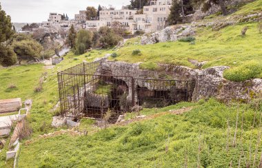 Jerusalem, Israel, February 29, 2020 : Ritual cave for burial in the cemetery of Karaites in the of Abu Tor district of Jerusalem city in Israel