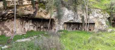 Jerusalem, Israel, February 29, 2020 : Ritual cave for burial in the Gey Ben Hinnom Park - called in the Holy Books as the Blazing Inferno in Jerusalem city in Israel