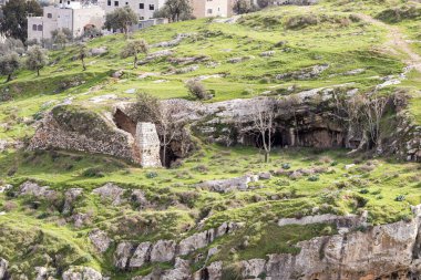 Jerusalem, Israel, February 29, 2020 : The ruins of an old Christian monastery are in the Gey Ben Hinnom Park - called in the Holy Books as the Blazing Inferno in Jerusalem city in Israel