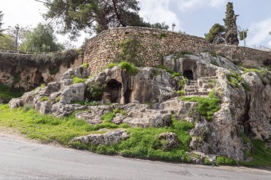 Jerusalem, Israel, February 29, 2020 : Ritual cave for burial in the Gey Ben Hinnom Park - called in the Holy Books as the Blazing Inferno in Jerusalem city in Israel