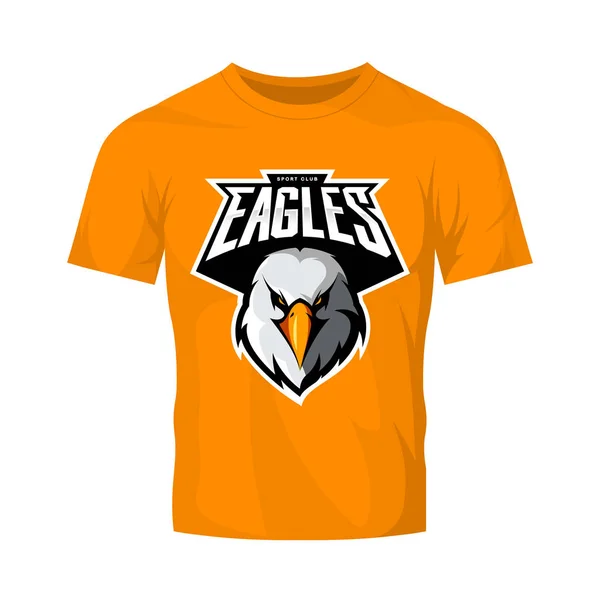 Furious eagle head athlétique club vecteur logo concept isolé sur t-shirt orange mockup . — Image vectorielle
