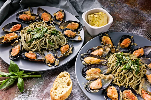 Delicious seafood pasta. Fresh mussels and pesto pasta. Mediterranean Kitchen.
