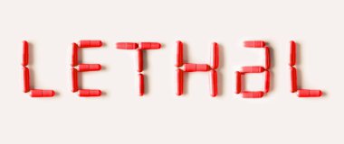 Kırmızı hap kapsül word Lethal şeklinde. Hayat izole kavramı.