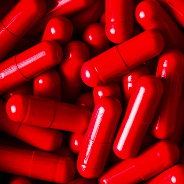 Pilules médicales et capsules motif plat, vue du dessus . — Photo
