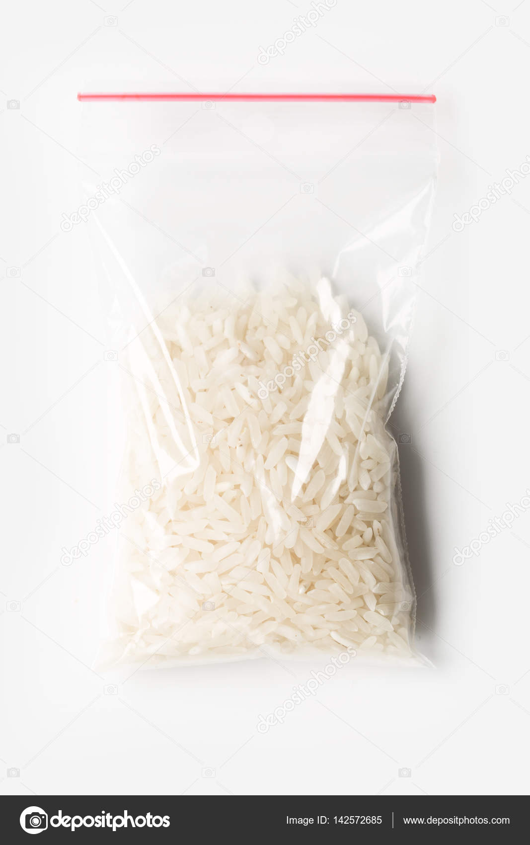 Download Plastic Transparent Zipper Bag With Half Uncooked White Basmati Rice Isolated On White Vacuum Package Mockup With Red Clip Concept Stock Photo Image By C Pavelvinnik 142572685