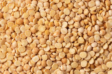 Sarı ham organik bezelye arka plan doku. Tahıl kadar kapatın.