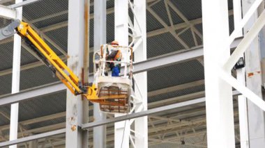işçi kask manipülatör ile Asansör içinde bina yapıları için yükselir