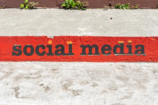 Ladder with social media text on concrete background. Digital ma — 图库照片