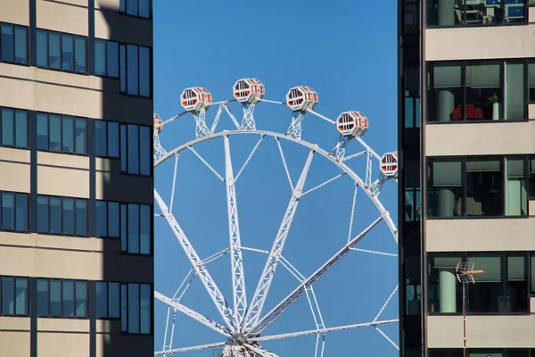 Carousel between skyscrapers — Stock Photo, Image