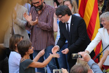 President of Catalonia Puigdemont receiving citizens who shall permit referendum clipart