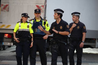 Catalan and Spanish police together in Barcelona clipart